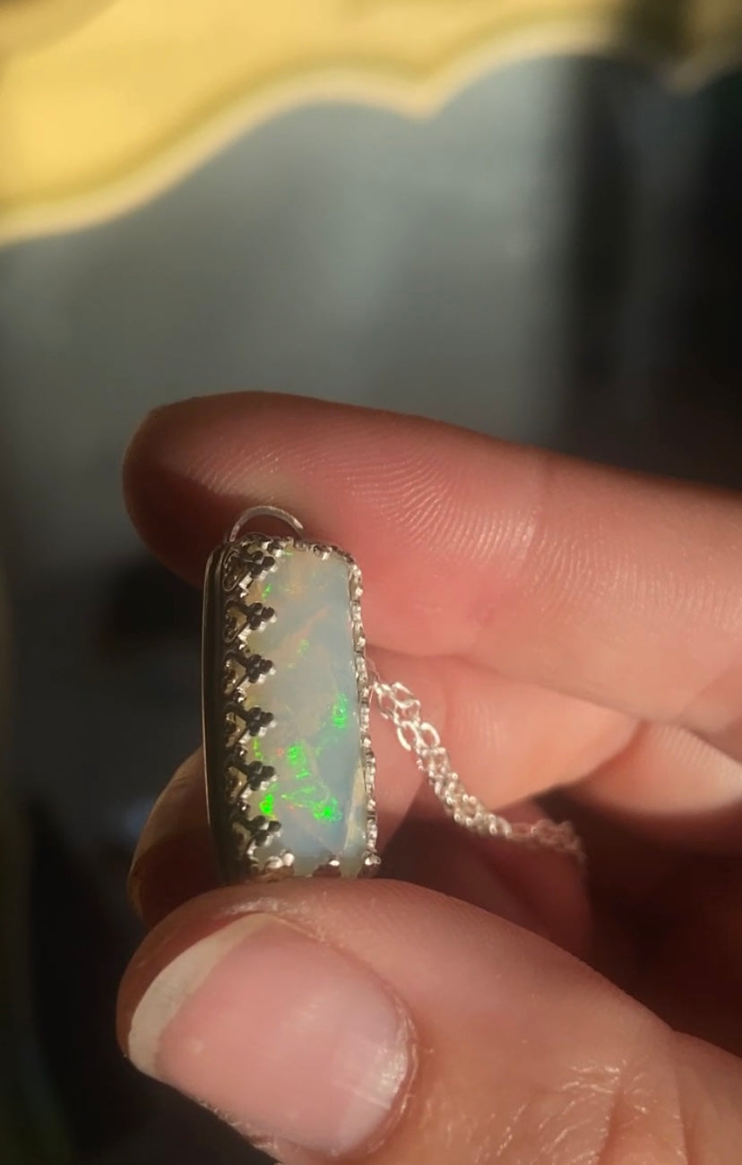 Appraised Ethiopian Opal in Silver Gallery Bezel