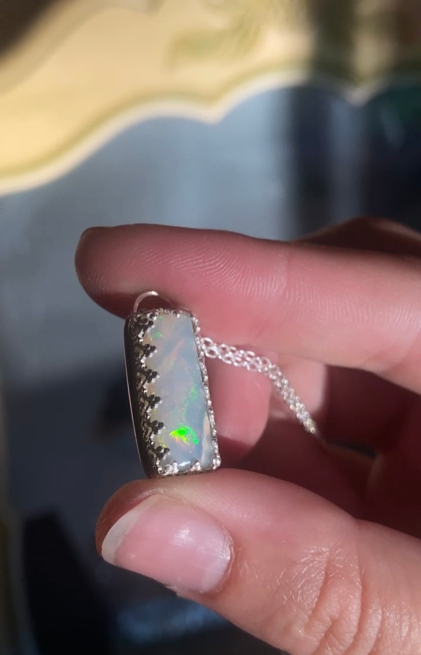 Appraised Ethiopian Opal in Silver Gallery Bezel