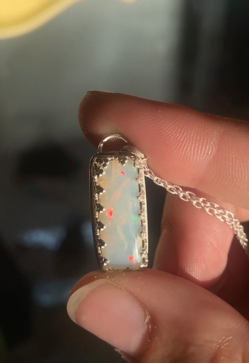 Appraised Ethiopian Opal in Silver Gallery Bezel
