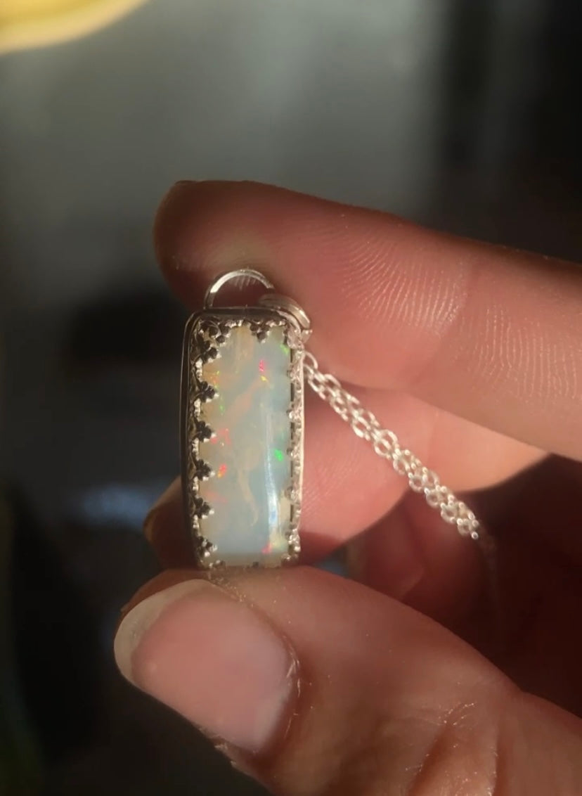 Appraised Ethiopian Opal in Silver Gallery Bezel