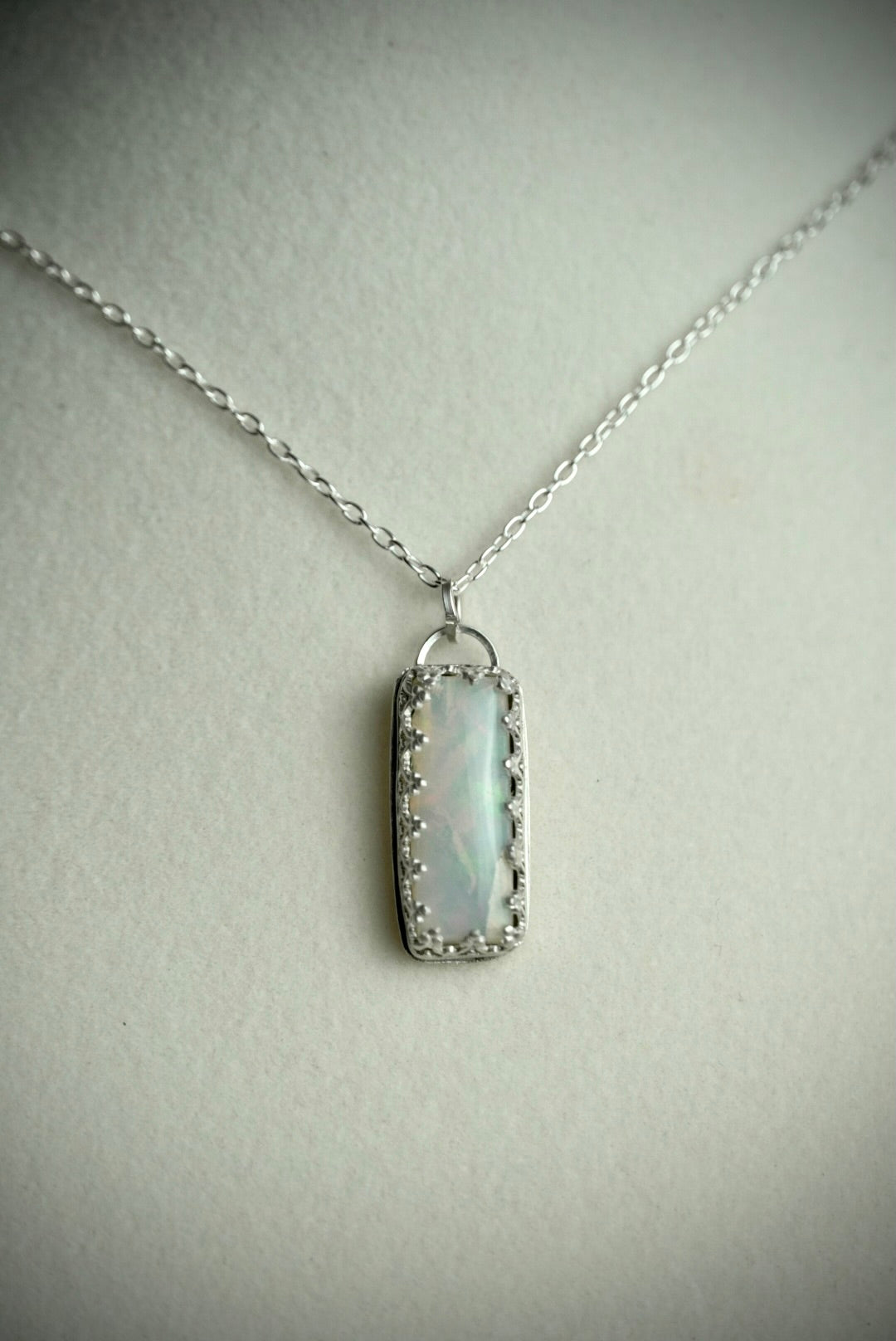 Appraised Ethiopian Opal in Silver Gallery Bezel
