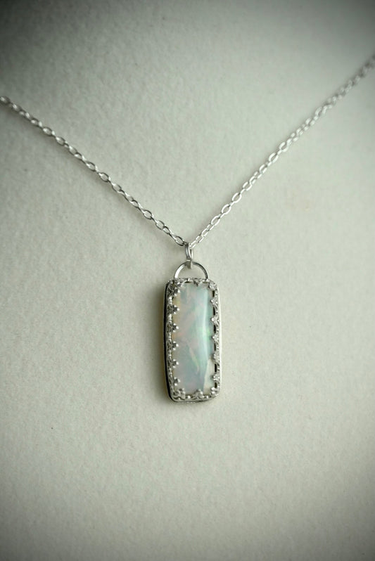 Appraised Ethiopian Opal in Silver Gallery Bezel