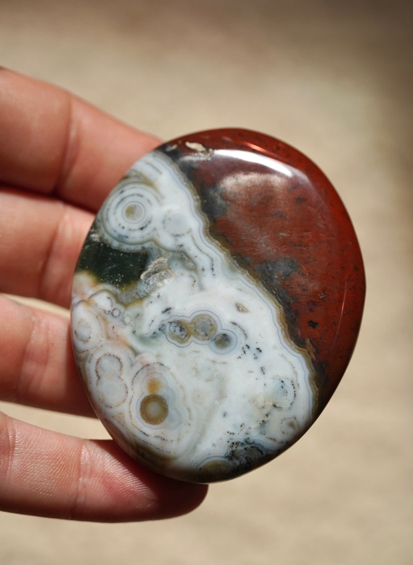 8th vein ocean jasper with red white and green coloring